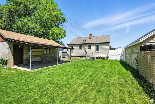 350 E 800 N, Spanish Fork, UT 84660 - rear view of property featuring a patio area and a chimney