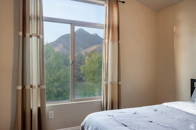 4179 W Sandalwood Dr, Cedar Hills, UT 84062 - bedroom featuring multiple windows and a mountain view