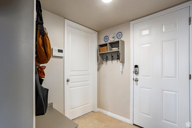 4179 W Sandalwood Dr, Cedar Hills, UT 84062 - doorway with baseboards and light tile patterned floors