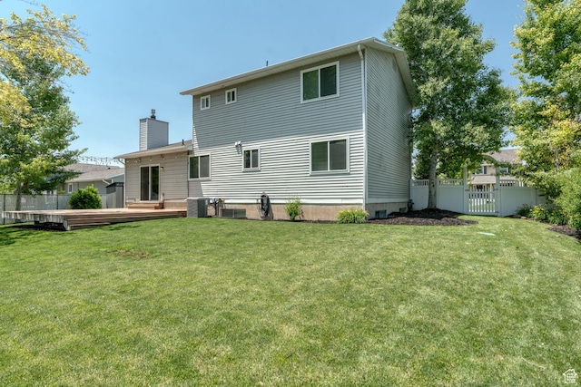 1732 N 280 W, Orem, UT 84057 - back of property featuring a chimney, a wooden deck, and a gate