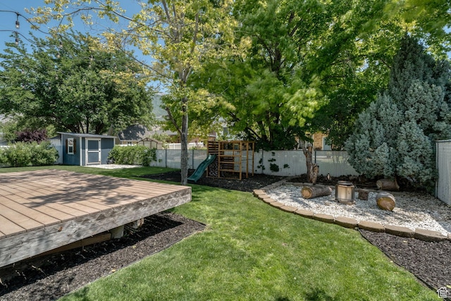 1732 N 280 W, Orem, UT 84057 - fenced backyard with a playground, a storage unit, and a deck