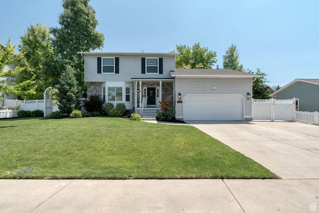 1732 N 280 W, Orem, UT 84057 - traditional-style house featuring a garage, driveway, a gate, and stone siding