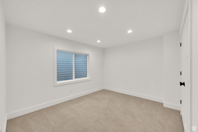 4961 E Oakwood Dr, Eagle Mountain, UT 84005 - unfurnished room with light colored carpet and recessed lighting