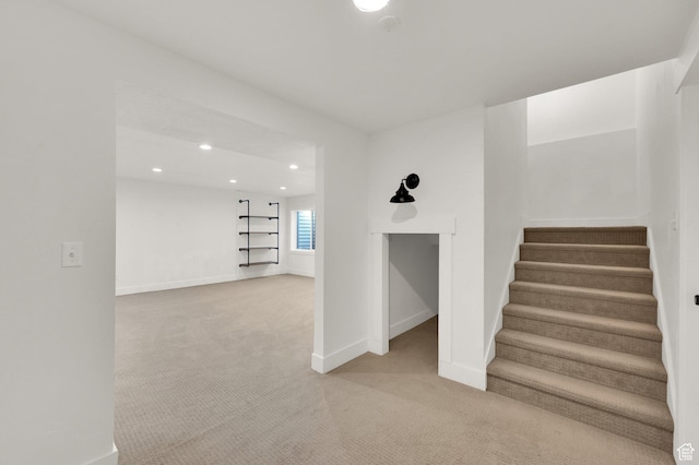 4961 E Oakwood Dr, Eagle Mountain, UT 84005 - staircase featuring carpet floors and recessed lighting