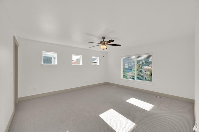 4961 E Oakwood Dr, Eagle Mountain, UT 84005 - spare room featuring light colored carpet and a ceiling fan