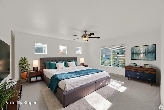 4961 E Oakwood Dr, Eagle Mountain, UT 84005 - bedroom with carpet, multiple windows, and a ceiling fan