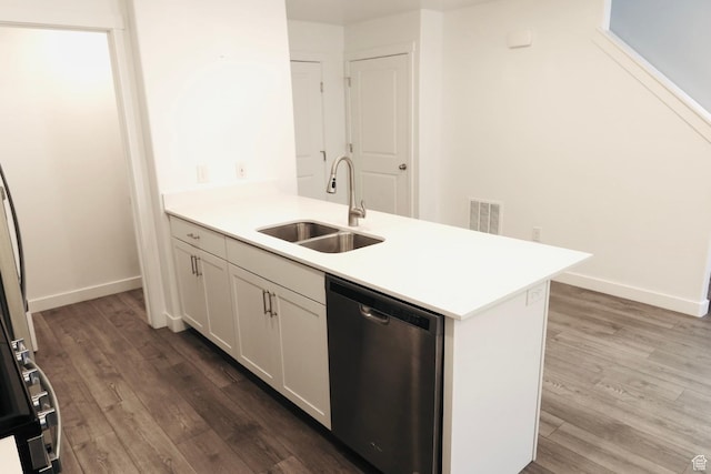 54 N Heading Row, Saratoga Springs, UT 84045 - kitchen with stainless steel dishwasher, dark wood-style floors, a peninsula, and light countertops