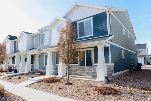 54 N Heading Row, Saratoga Springs, UT 84045 - view of front of home featuring a porch and stone siding