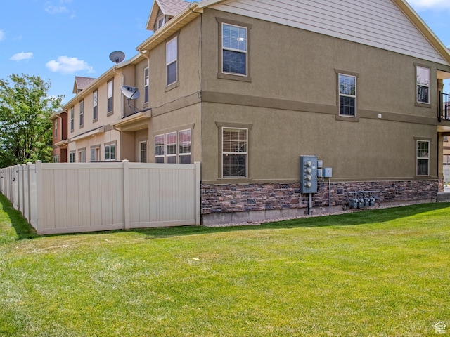 1556 N Venetian Way W, Saratoga Springs, UT 84045 - back of house with stucco siding and stone siding