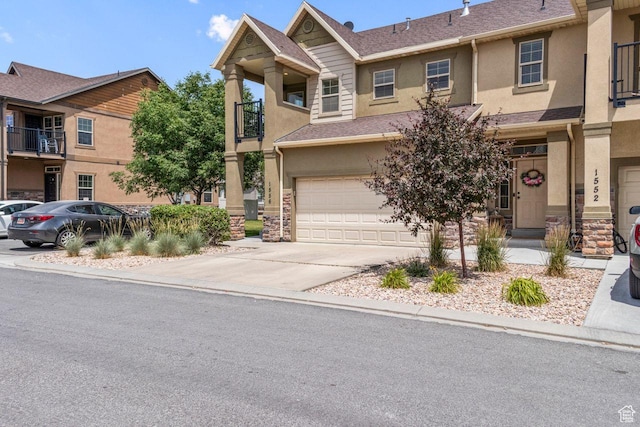 1556 N Venetian Way W, Saratoga Springs, UT 84045 - multi unit property featuring stucco siding, an attached garage, stone siding, and driveway