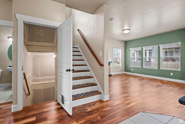 1556 N Venetian Way W, Saratoga Springs, UT 84045 - staircase featuring wood finished floors