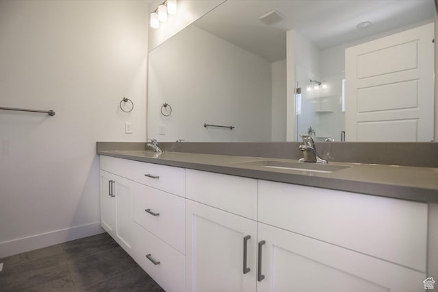 136 E Abbeville Ct, Sandy, UT 84070 - bathroom featuring double vanity and tile patterned floors