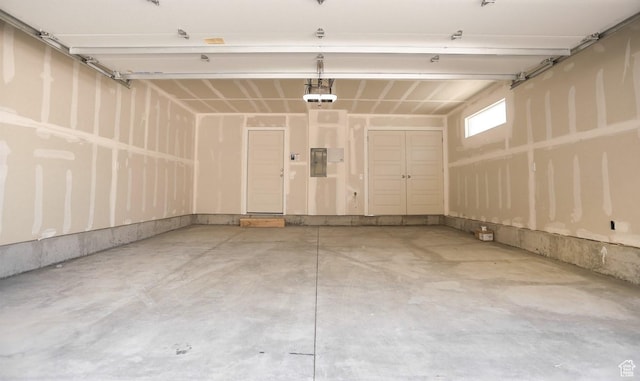 136 E Abbeville Ct, Sandy, UT 84070 - garage with electric panel and a garage door opener