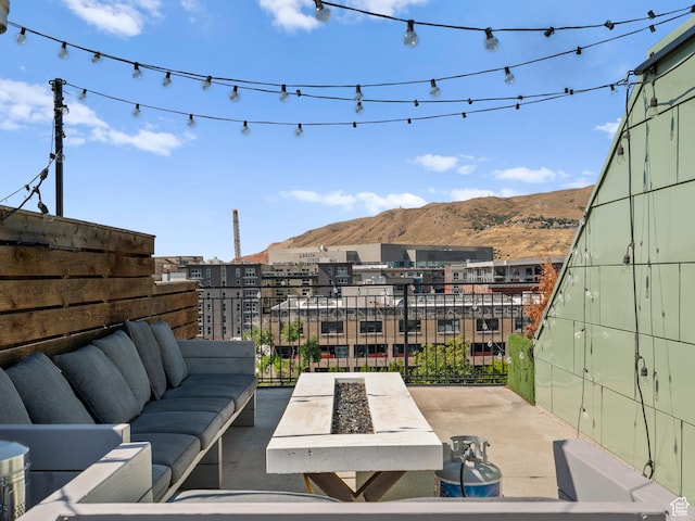 360 W Broadway S Unit 619, Salt Lake City, UT 84101 - view of patio with an outdoor living space and a mountain view