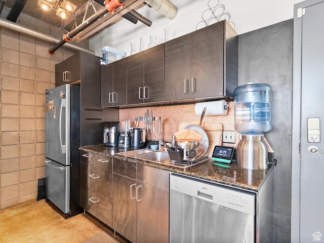 360 W Broadway S Unit 619, Salt Lake City, UT 84101 - kitchen featuring appliances with stainless steel finishes, dark stone counters, tasteful backsplash, and dark brown cabinets