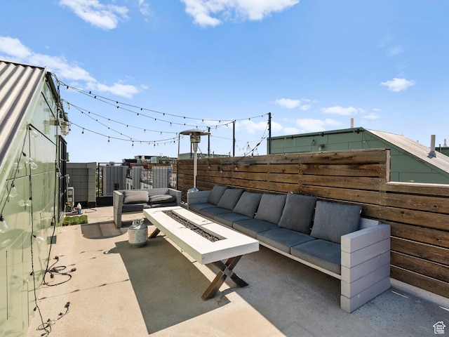 360 W Broadway S Unit 619, Salt Lake City, UT 84101 - fenced backyard featuring an outdoor living space with a fire pit and a patio