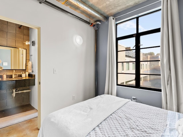 360 W Broadway S Unit 619, Salt Lake City, UT 84101 - bedroom featuring a sink and ensuite bath