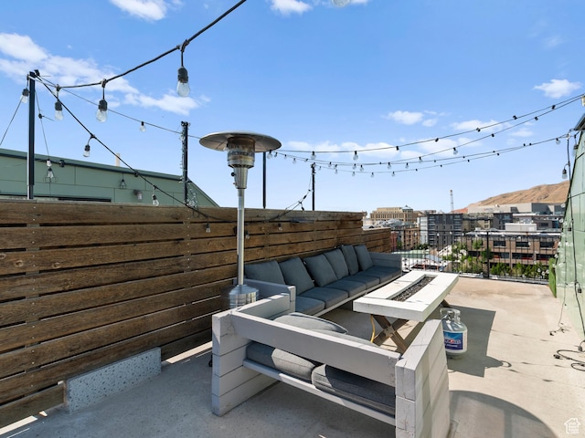 360 W Broadway S Unit 619, Salt Lake City, UT 84101 - view of patio with an outdoor living space with a fire pit