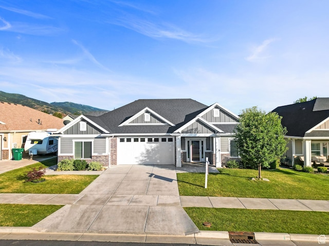 1302 E Mary Ln, Layton, UT 84040 - craftsman house featuring board and batten siding, concrete driveway, a front yard, stone siding, and an attached garage