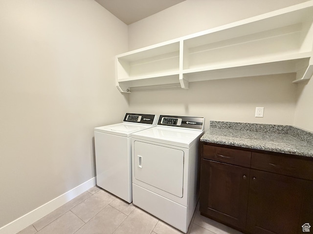 1302 E Mary Ln, Layton, UT 84040 - laundry room with washing machine and dryer, light tile patterned floors, and cabinet space