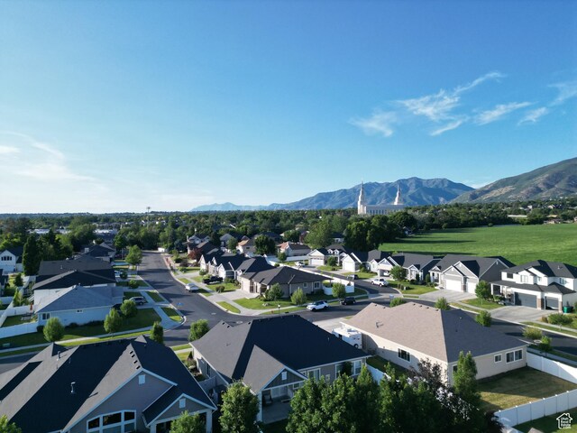 1302 E Mary Ln, Layton, UT 84040 - aerial view of residential area with a mountain backdrop