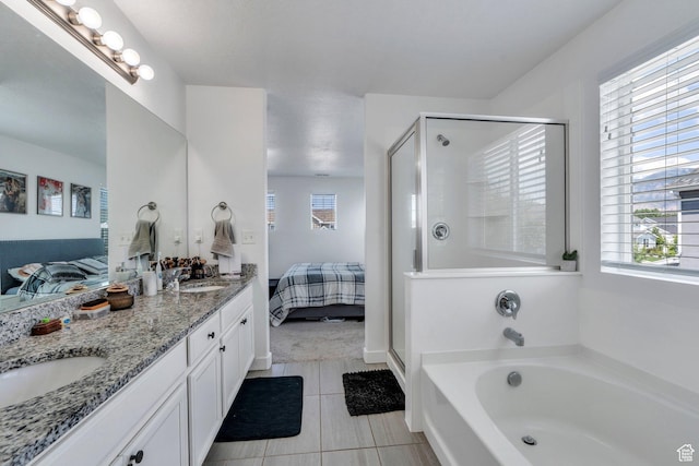 233 W 930 S, American Fork, UT 84003 - ensuite bathroom with a shower stall, a bath, double vanity, and tile patterned flooring