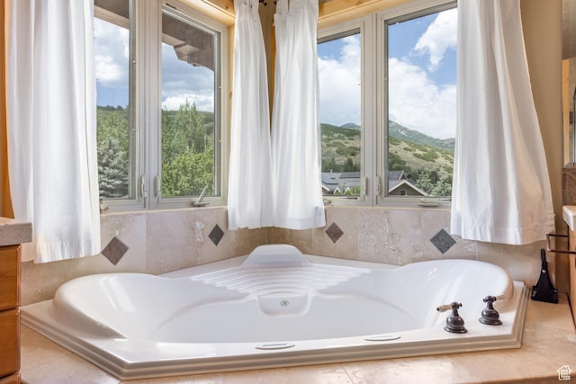 1297 W Lime Canyon Way N, Midway, UT 84049 - full bathroom featuring healthy amount of natural light, a bath, vanity, and a mountain view