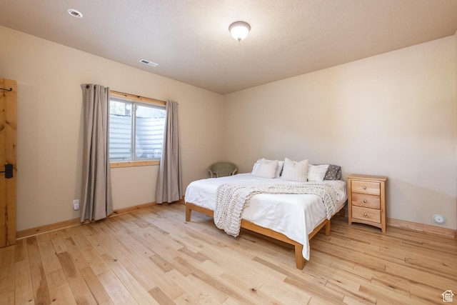 1297 W Lime Canyon Way N, Midway, UT 84049 - bedroom with light wood finished floors and baseboards