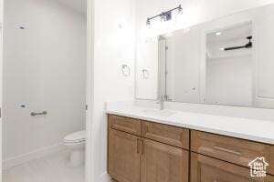 2140 W 320 S Unit 48-51, Hurricane, UT 84737 - bathroom featuring vanity and toilet