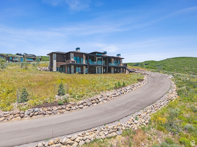 13690 N Deer Canyon Dr, Kamas, UT 84036 - back of property featuring a chimney