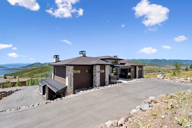 13690 N Deer Canyon Dr, Kamas, UT 84036 - view of front of property with a mountain view and a chimney