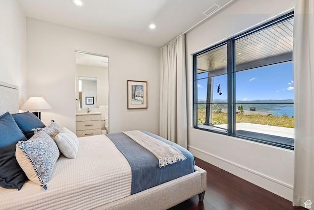 13690 N Deer Canyon Dr, Kamas, UT 84036 - bedroom with dark wood-style flooring, recessed lighting, a water view, and ensuite bathroom