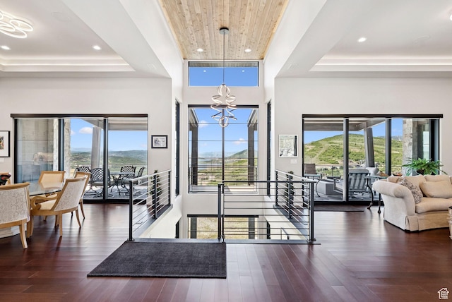 13690 N Deer Canyon Dr, Kamas, UT 84036 - foyer featuring a raised ceiling, a chandelier, healthy amount of natural light, recessed lighting, and a high ceiling