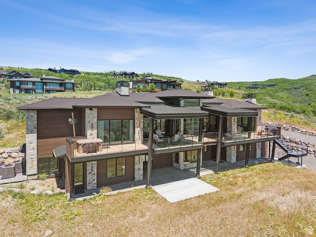 13690 N Deer Canyon Dr, Kamas, UT 84036 - rear view of property featuring stone siding