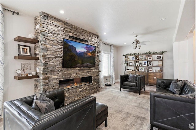 2718 N 2125 E, Layton, UT 84040 - living room with ceiling fan, a stone fireplace, and recessed lighting