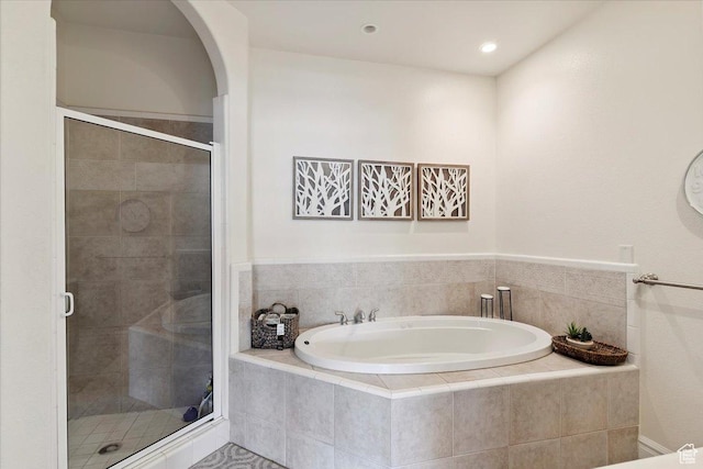 2718 N 2125 E, Layton, UT 84040 - bathroom featuring a bath, a stall shower, and recessed lighting