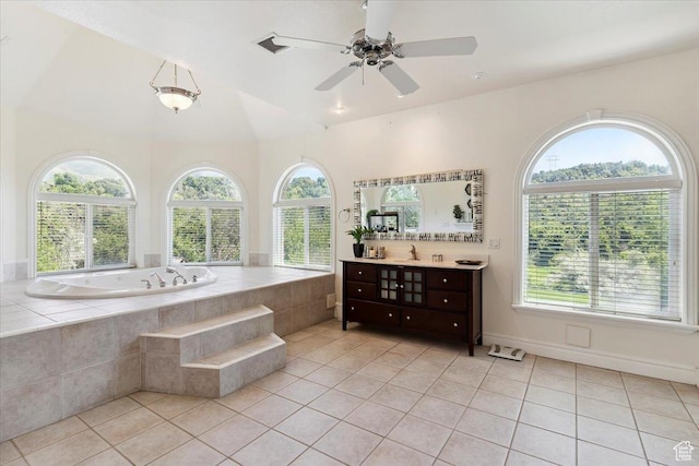 2718 N 2125 E, Layton, UT 84040 - bathroom with vanity, a bath, tile patterned floors, a ceiling fan, and vaulted ceiling