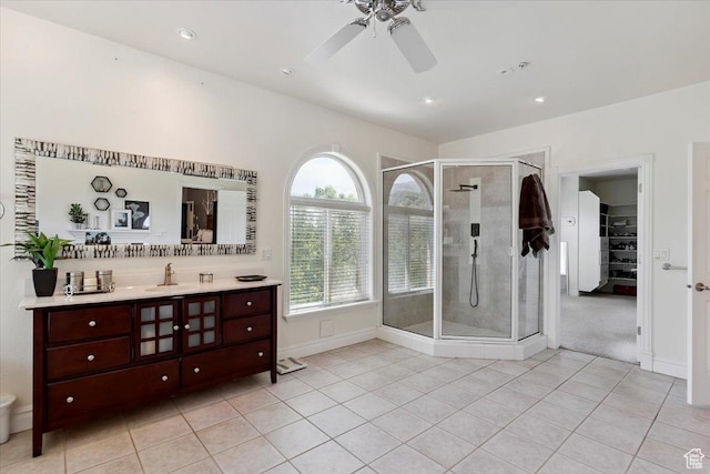 2718 N 2125 E, Layton, UT 84040 - bathroom featuring tile patterned flooring, a shower stall, vanity, ceiling fan, and recessed lighting