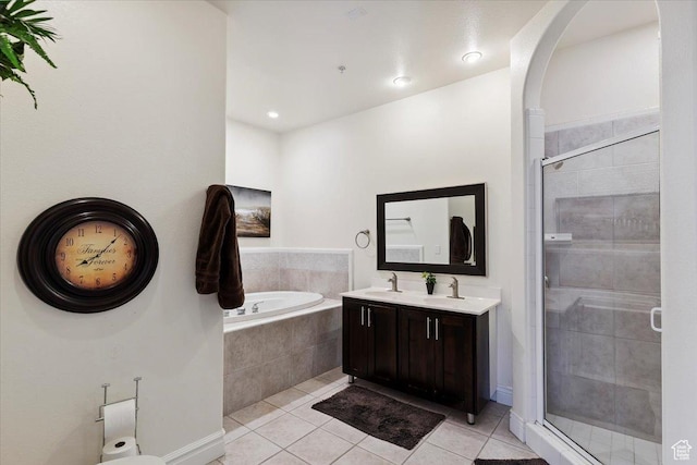 2718 N 2125 E, Layton, UT 84040 - bathroom featuring tile patterned floors, a garden tub, a shower stall, and double vanity