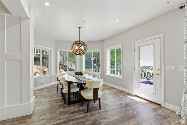 2718 N 2125 E, Layton, UT 84040 - dining space featuring wood finished floors, a chandelier, and recessed lighting