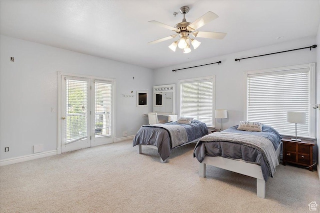 2718 N 2125 E, Layton, UT 84040 - carpeted bedroom featuring access to outside, multiple windows, and a ceiling fan
