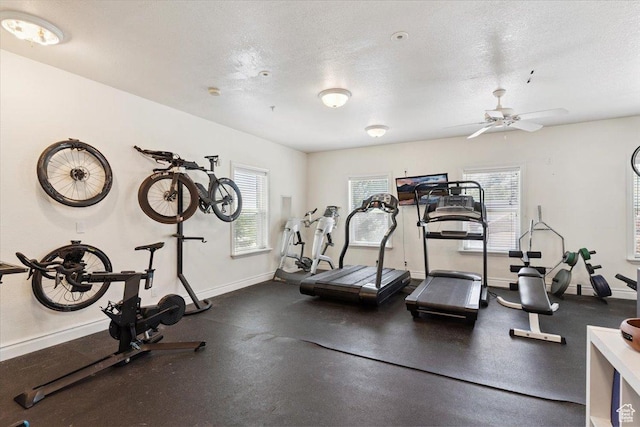 2718 N 2125 E, Layton, UT 84040 - workout area with healthy amount of natural light, a ceiling fan, and a textured ceiling