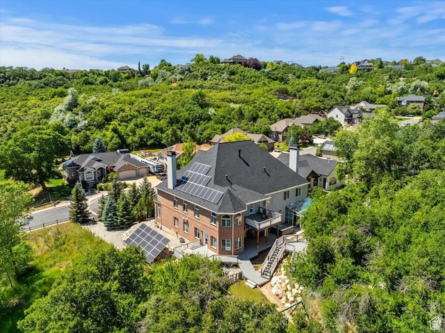 2718 N 2125 E, Layton, UT 84040 - aerial view of residential area with a heavily wooded area