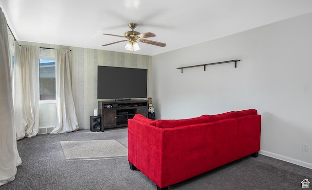 985 Jackson Ave, Ogden, UT 84404 - living room featuring carpet floors and a ceiling fan
