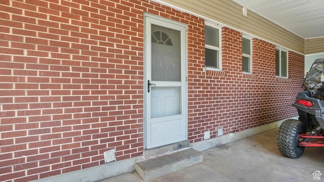 985 Jackson Ave, Ogden, UT 84404 - doorway to property featuring brick siding