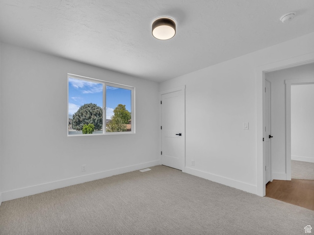 6685 S 3380 W, West Jordan, UT 84084 - unfurnished bedroom with carpet flooring and baseboards