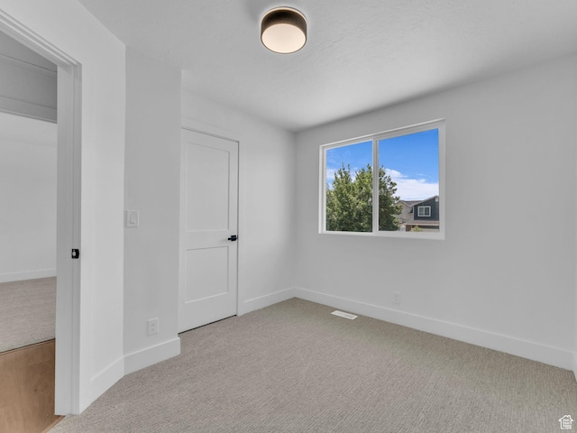 6685 S 3380 W, West Jordan, UT 84084 - unfurnished bedroom featuring carpet flooring and baseboards