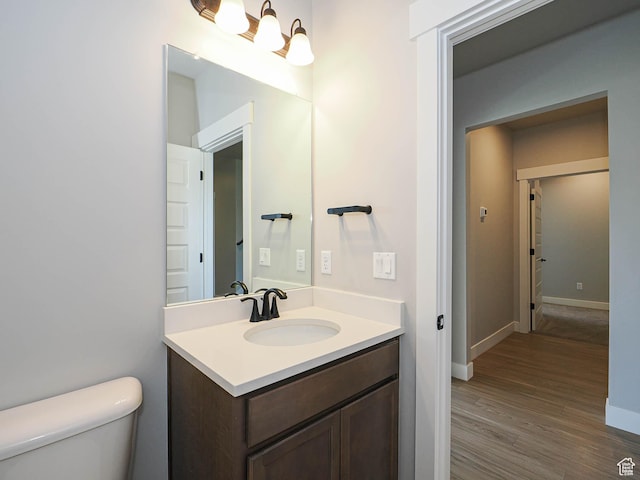 928 E Blackfeet Dr, Eagle Mountain, UT 84005 - bathroom featuring vanity and wood finished floors