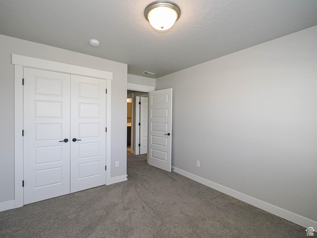 928 E Blackfeet Dr, Eagle Mountain, UT 84005 - unfurnished bedroom with a closet and carpet floors