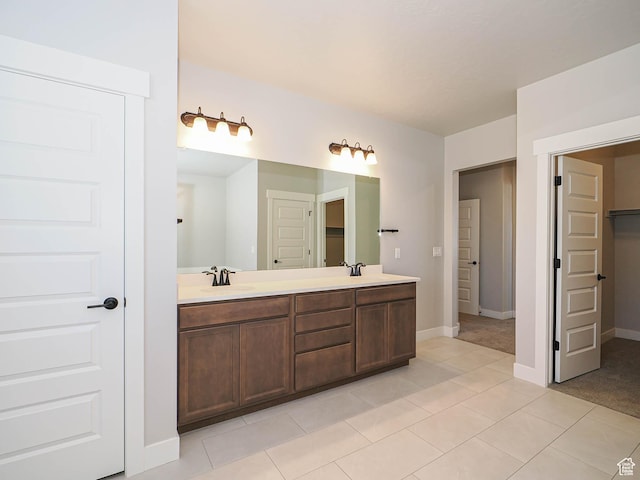 928 E Blackfeet Dr, Eagle Mountain, UT 84005 - full bath featuring double vanity and tile patterned floors